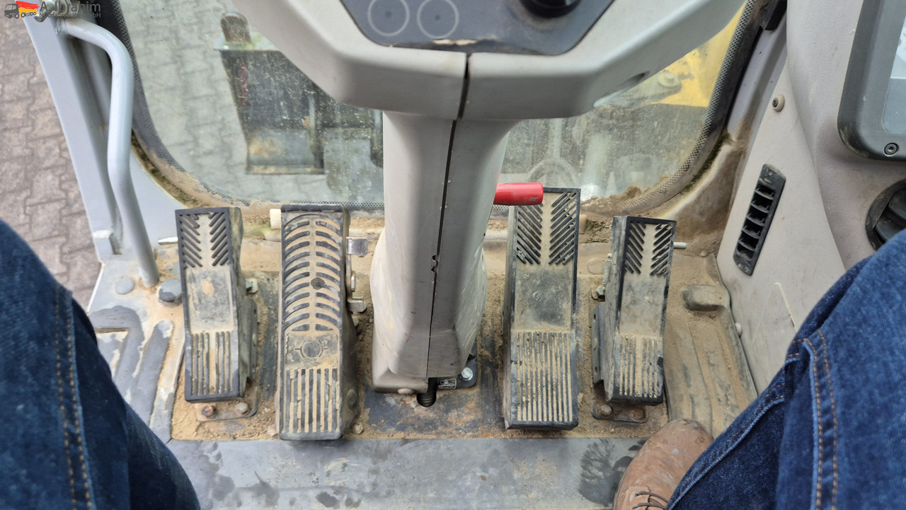 New Holland MH 2.6 Zustand gut, deutsche Maschine incl. Greifer und Dreservo - Escavadeira de rodas: foto 5 New Holland MH 2.6 Zustand gut, deutsche Maschine incl. Greifer und Dreservo - Escavadeira de rodas: foto 5