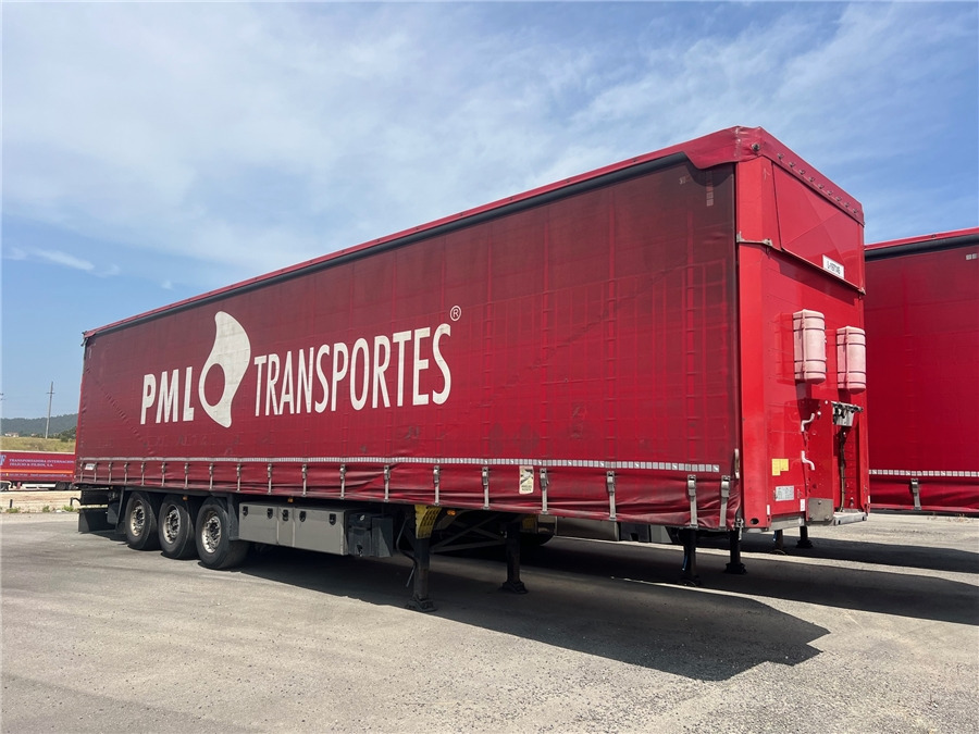 SCHMITZ CARGOBULL SCB-S3T TETO ELEVAR - Semi-reboque de lona: foto 1 SCHMITZ CARGOBULL SCB-S3T TETO ELEVAR - Semi-reboque de lona: foto 1