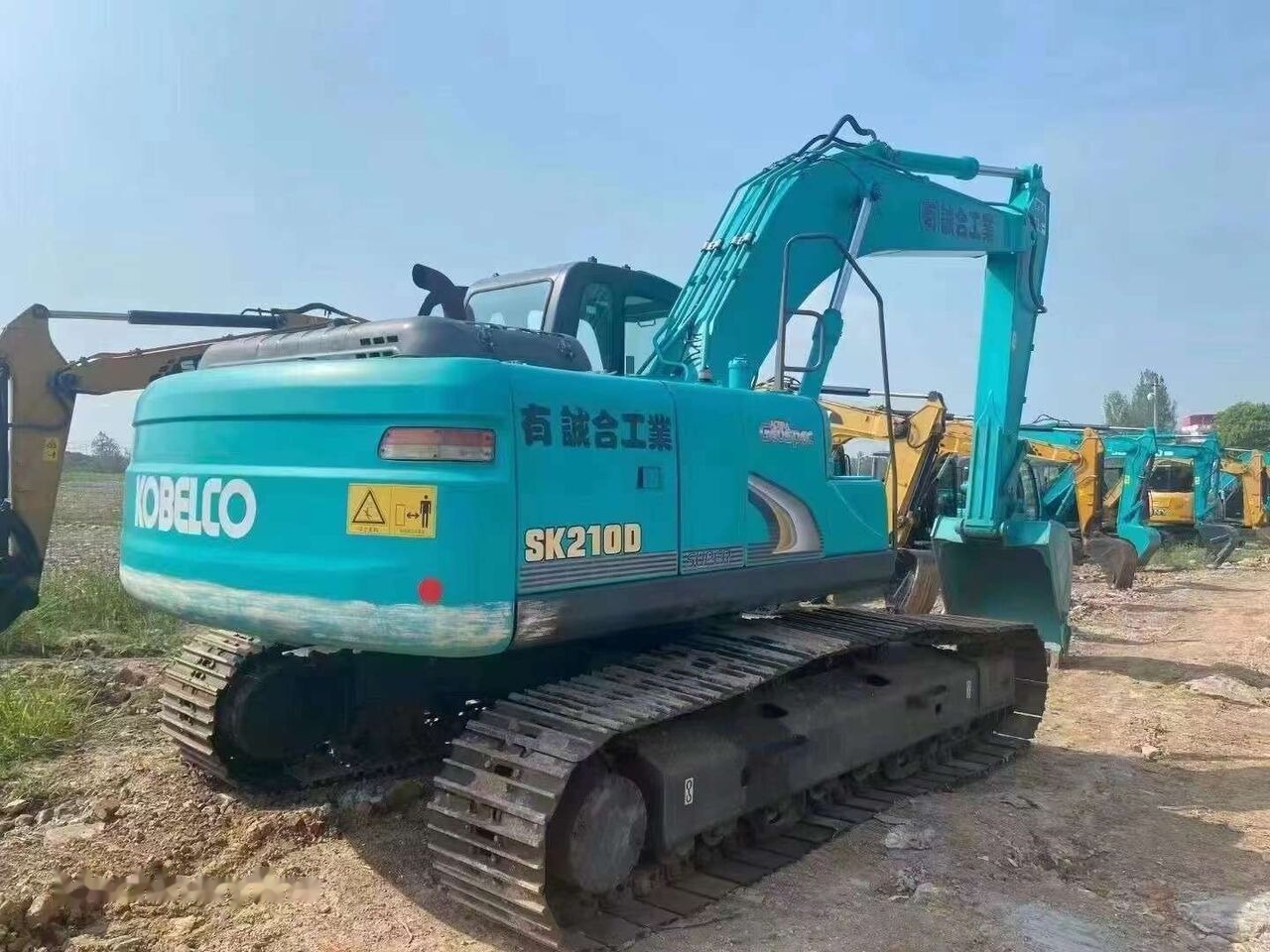 Kobelco SK210D - Escavadora de rastos: foto 2 Kobelco SK210D - Escavadora de rastos: foto 2