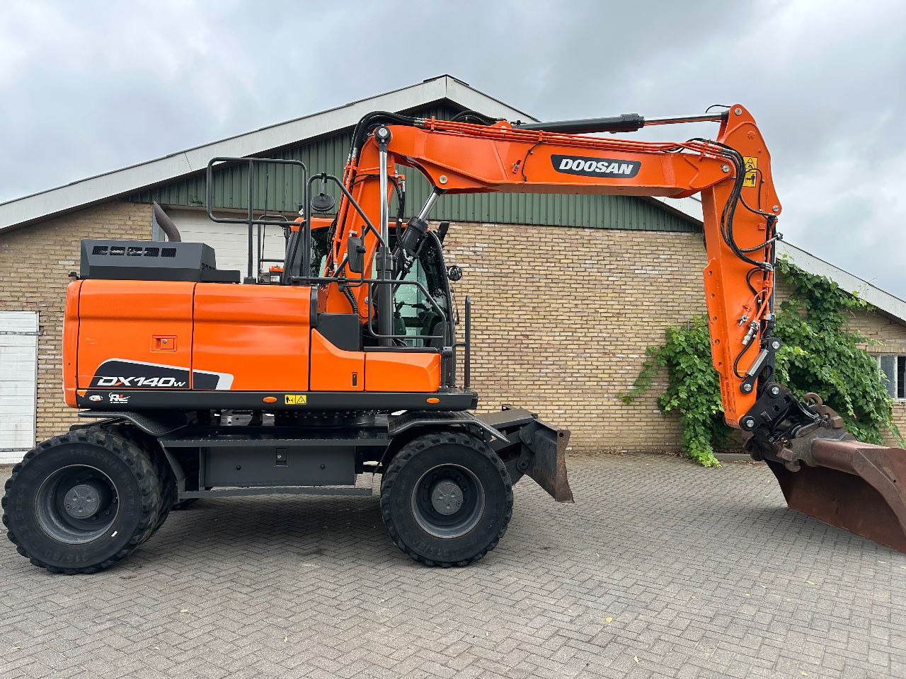 Doosan DX140W-5 - Escavadeira de rodas: foto 5 Doosan DX140W-5 - Escavadeira de rodas: foto 5