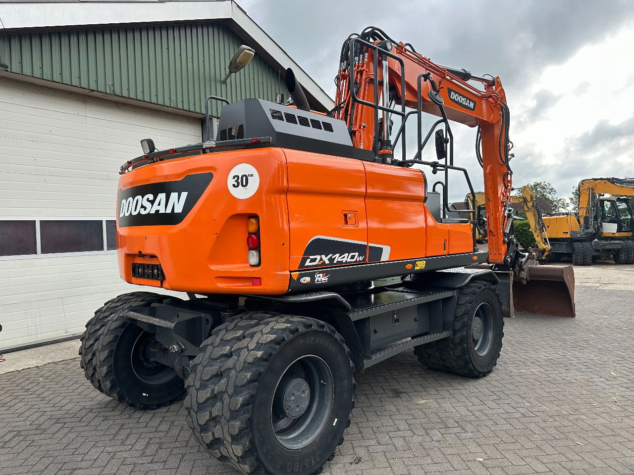 Doosan DX140W-5 - Escavadeira de rodas: foto 4 Doosan DX140W-5 - Escavadeira de rodas: foto 4