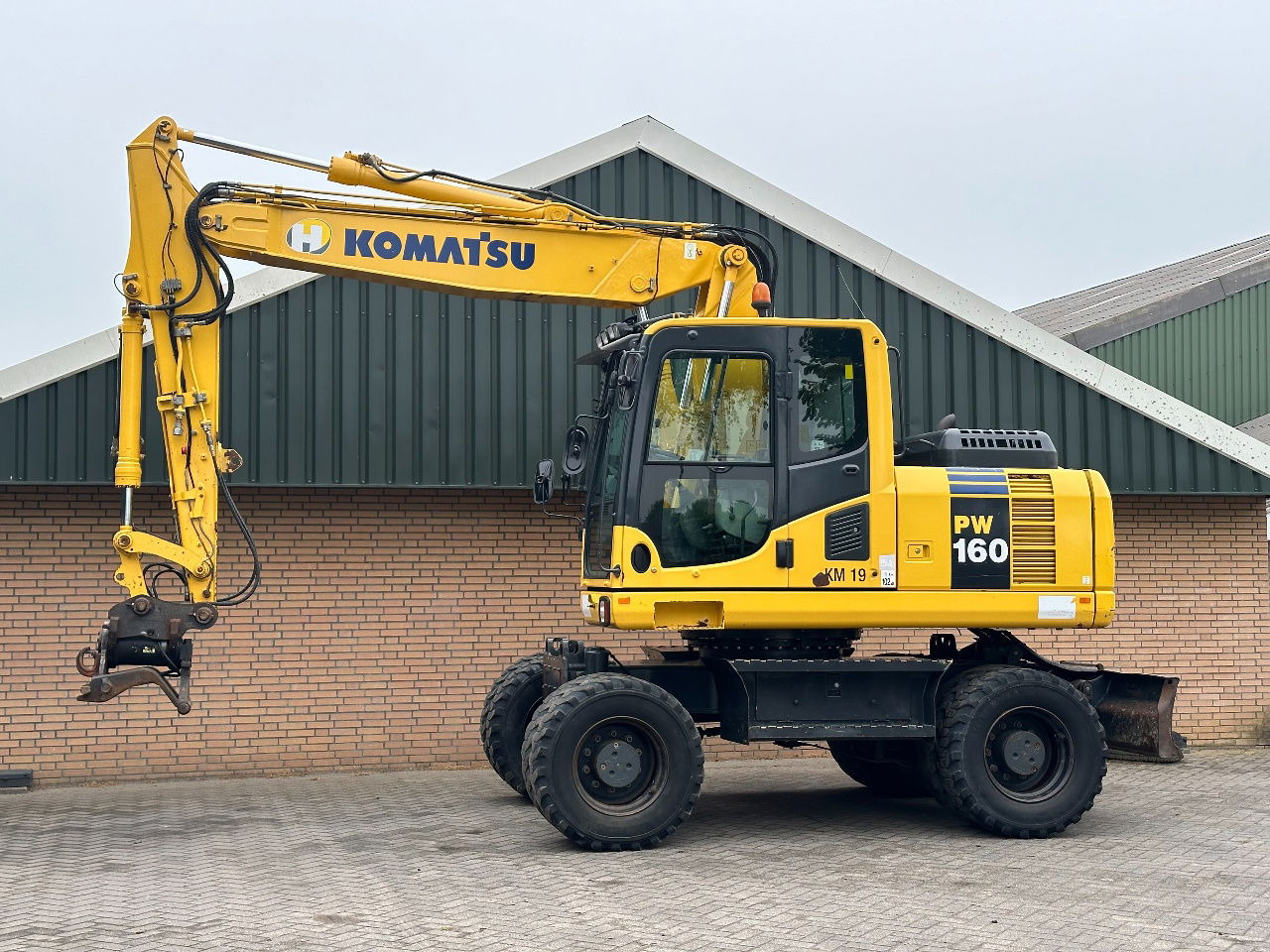 Komatsu PW160-8 - Escavadeira de rodas: foto 1 Komatsu PW160-8 - Escavadeira de rodas: foto 1