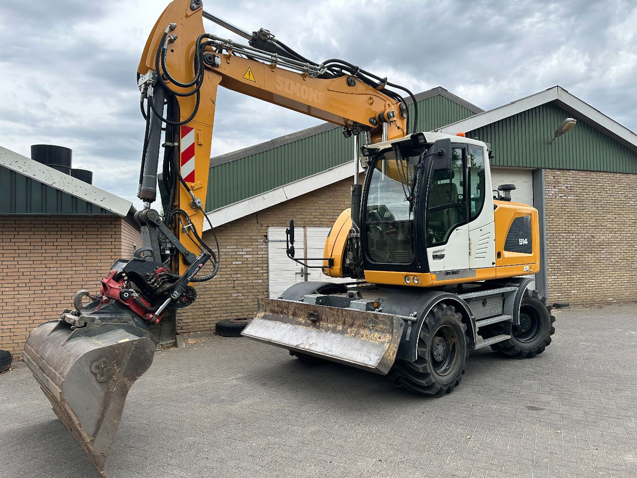 Liebherr A914 - Escavadeira de rodas: foto 1 Liebherr A914 - Escavadeira de rodas: foto 1