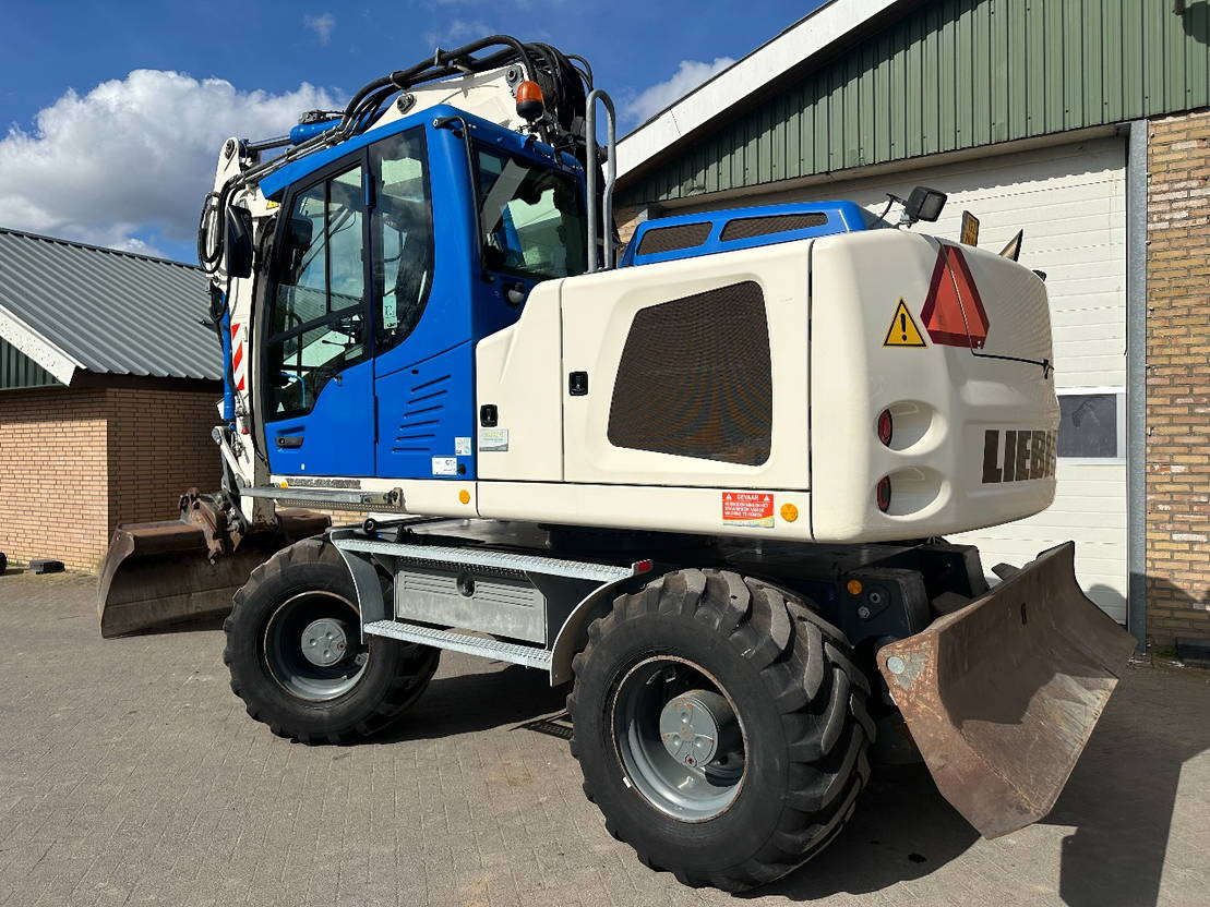 Liebherr A914 - Escavadeira de rodas: foto 2 Liebherr A914 - Escavadeira de rodas: foto 2