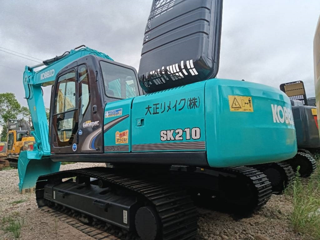 Kobelco SK 210 - Escavadora de rastos: foto 1 Kobelco SK 210 - Escavadora de rastos: foto 1