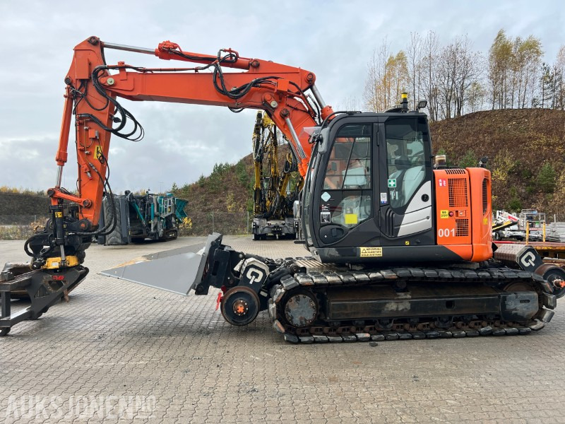 2015 Hitachi ZX135-US Rail maskin med henger, tilt, klype, 6 skuffer, klype - Escavadeira: foto 2 2015 Hitachi ZX135-US Rail maskin med henger, tilt, klype, 6 skuffer, klype - Escavadeira: foto 2