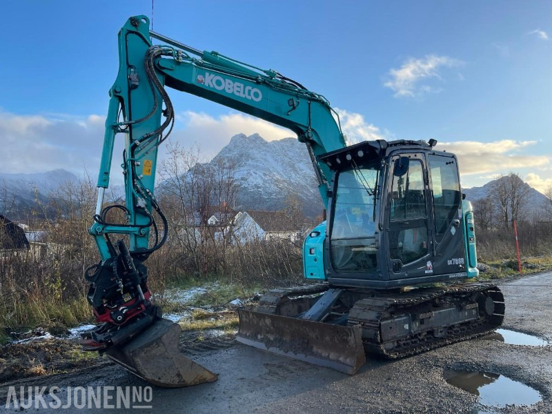 2021 Kobelco SK75SR-7 Gravemaskin med skjær, tiltrotator med gripekassett, nylig sertifisert, kun 2400 timer - Escavadeira: foto 1 2021 Kobelco SK75SR-7 Gravemaskin med skjær, tiltrotator med gripekassett, nylig sertifisert, kun 2400 timer - Escavadeira: foto 1