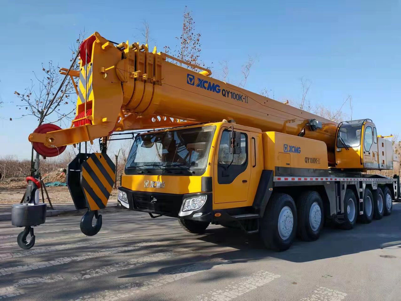 XCMG 100 Ton used truck crane QY100 with 68 meter telescopic boom on sale - Grua móvel: foto 1 XCMG 100 Ton used truck crane QY100 with 68 meter telescopic boom on sale - Grua móvel: foto 1