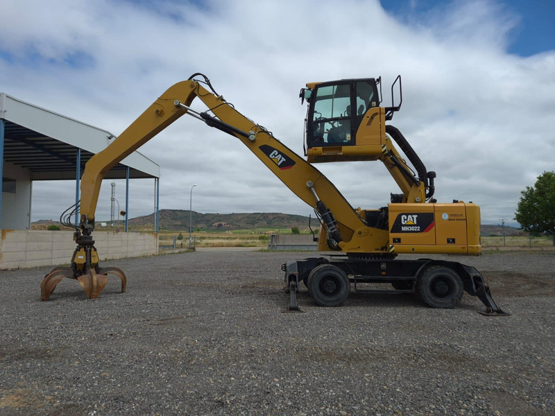 Caterpillar MH3022 - Escavadeira de rodas: foto 1 Caterpillar MH3022 - Escavadeira de rodas: foto 1
