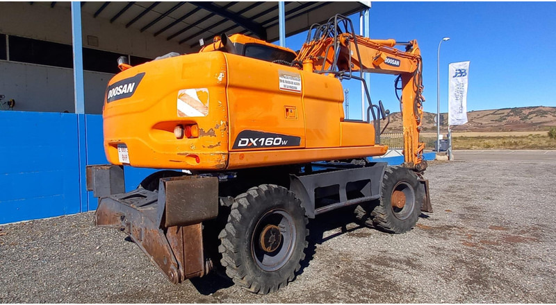 Doosan DX140W-3 - Escavadeira de rodas: foto 4 Doosan DX140W-3 - Escavadeira de rodas: foto 4