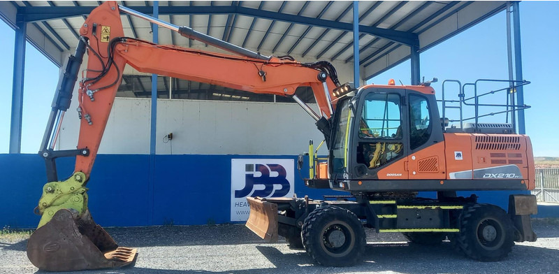 Doosan DX210W-5 - Escavadeira de rodas: foto 1 Doosan DX210W-5 - Escavadeira de rodas: foto 1