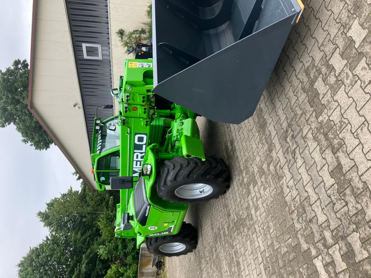 Merlo P50.18 CS INKL LEICHTGUTSCHAUFEL - Empilhador telescópico: foto 2 Merlo P50.18 CS INKL LEICHTGUTSCHAUFEL - Empilhador telescópico: foto 2