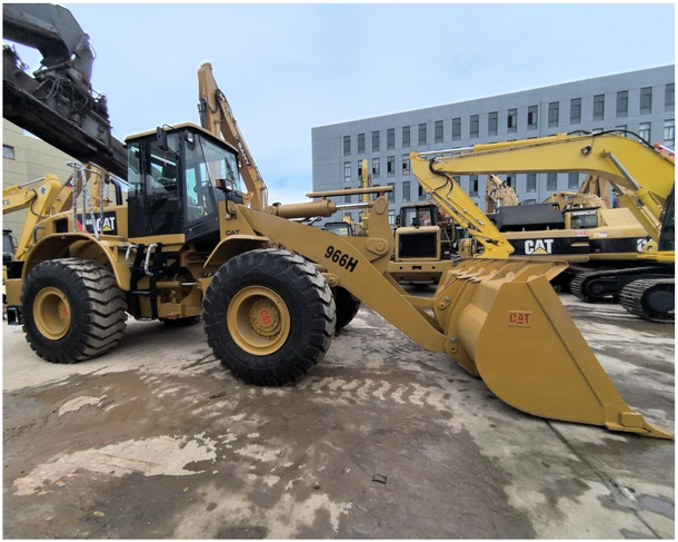 Good Condition High Performance Used Caterpillar Wheel Loader 966h for sale in shanghai yard - Pá carregadora de rodas: foto 1 Good Condition High Performance Used Caterpillar Wheel Loader 966h for sale in shanghai yard - Pá carregadora de rodas: foto 1