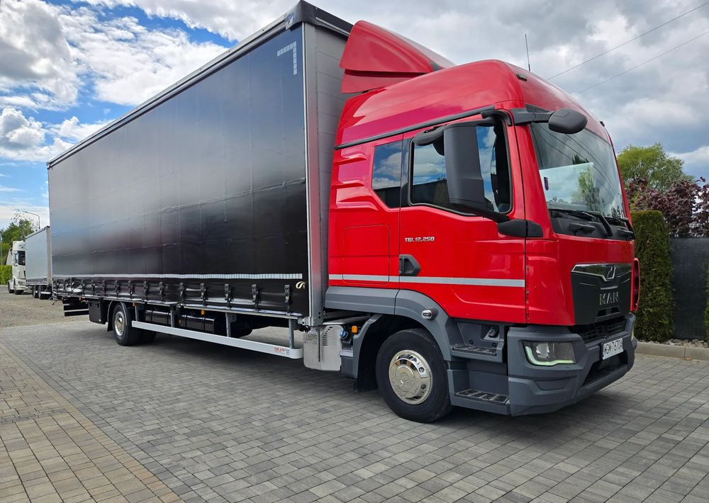 MAN TGL 12.250 - Camião de lona: foto 2 MAN TGL 12.250 - Camião de lona: foto 2