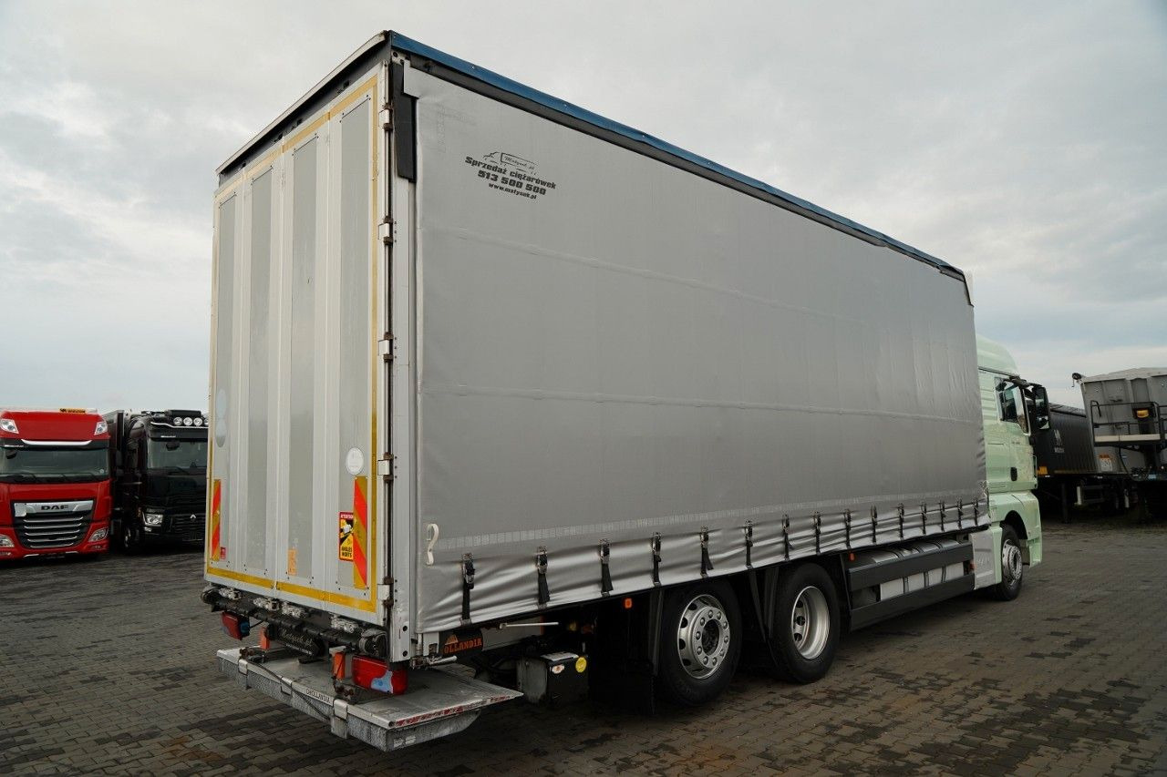 MAN TGX 26.440 / 6x2 / FIRANKA - 8,15 m / SOLÓWKA / MAN TGX 26.440 / 6x2 / FIRANKA - 8,15 m / SOLÓWKA / - Camião de lona: foto 4 MAN TGX 26.440 / 6x2 / FIRANKA - 8,15 m / SOLÓWKA / MAN TGX 26.440 / 6x2 / FIRANKA - 8,15 m / SOLÓWKA / - Camião de lona: foto 4