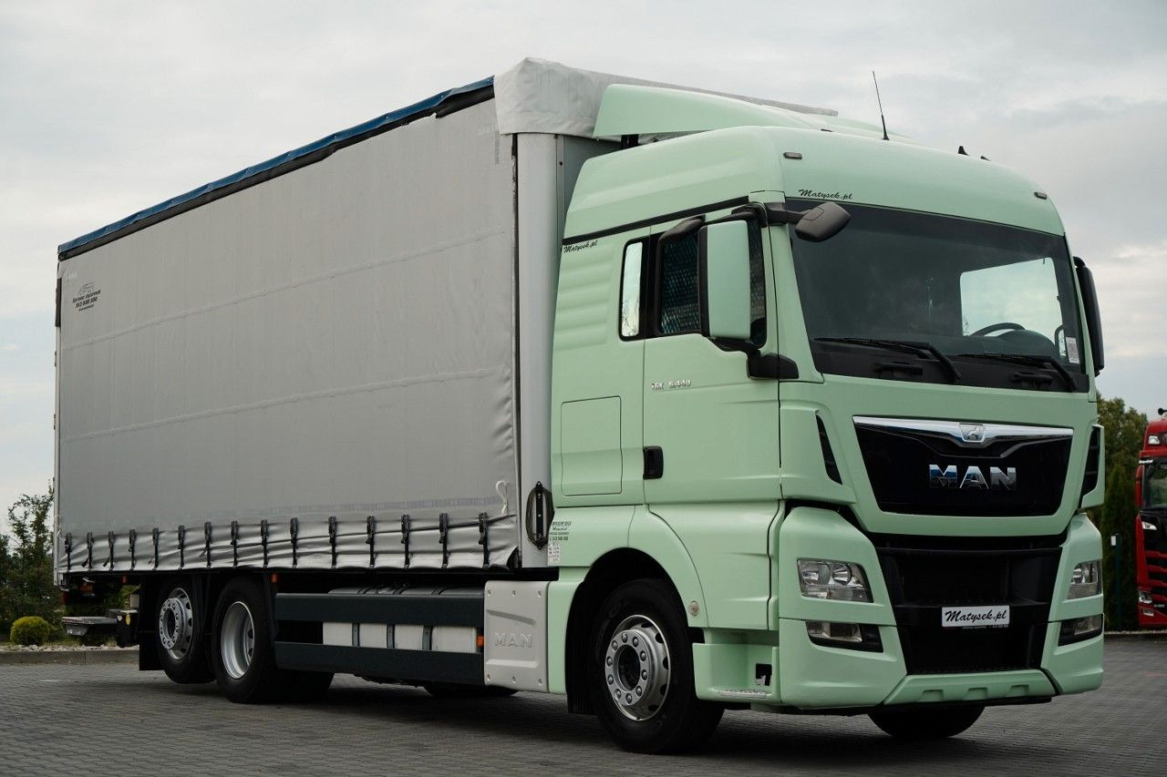 MAN TGX 26.440 / 6x2 / FIRANKA - 8,15 m / SOLÓWKA / MAN TGX 26.440 / 6x2 / FIRANKA - 8,15 m / SOLÓWKA / - Camião de lona: foto 1 MAN TGX 26.440 / 6x2 / FIRANKA - 8,15 m / SOLÓWKA / MAN TGX 26.440 / 6x2 / FIRANKA - 8,15 m / SOLÓWKA / - Camião de lona: foto 1