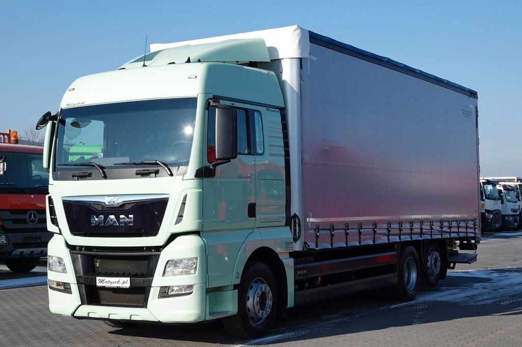 MAN TGX 26.440 / 6x2 / FIRANKA - 8,15 m / SOLÓWKA / - Camião de lona: foto 1 MAN TGX 26.440 / 6x2 / FIRANKA - 8,15 m / SOLÓWKA / - Camião de lona: foto 1