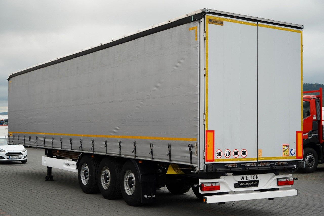 Wielton FIRANKA / STANDARD / OŚ PODNOSZONA / PLANDEKA Z - Semi-reboque de lona: foto 4 Wielton FIRANKA / STANDARD / OŚ PODNOSZONA / PLANDEKA Z - Semi-reboque de lona: foto 4