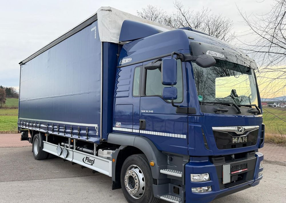 MAN TGM 18.340 / FIRANKA / LIFT / SPROWADZONY / KLIMA POSTOJOWA / 2017 / 9700 ŁADOWNOŚĆ / AUTOMAT / 18 PALET / E6 / WINDA / - Camião de lona: foto 1 MAN TGM 18.340 / FIRANKA / LIFT / SPROWADZONY / KLIMA POSTOJOWA / 2017 / 9700 ŁADOWNOŚĆ / AUTOMAT / 18 PALET / E6 / WINDA / - Camião de lona: foto 1
