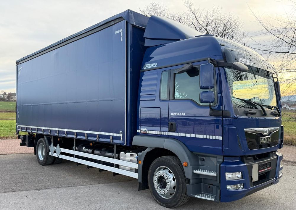 MAN TGM 18.340 / FIRANKA / SPROWADZONY / 9100 ŁADOWNOŚĆ / 18 PALET / E6 / WINDA / - Camião de lona: foto 1 MAN TGM 18.340 / FIRANKA / SPROWADZONY / 9100 ŁADOWNOŚĆ / 18 PALET / E6 / WINDA / - Camião de lona: foto 1
