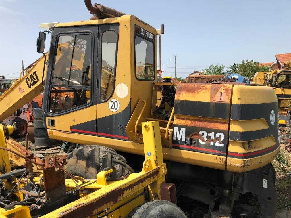 CAT M 312 FOR PARTS - Escavadeira de rodas: foto 1 CAT M 312 FOR PARTS - Escavadeira de rodas: foto 1