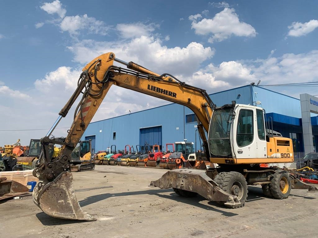 Liebherr A 900 C - Escavadeira de rodas: foto 1 Liebherr A 900 C - Escavadeira de rodas: foto 1
