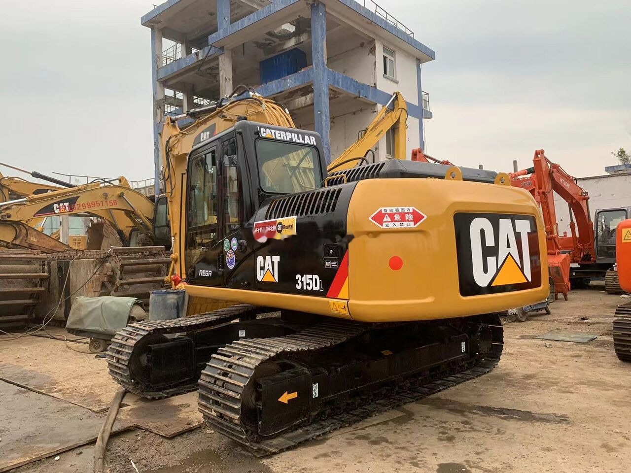 Caterpillar 315DL - Escavadora de rastos: foto 1 Caterpillar 315DL - Escavadora de rastos: foto 1