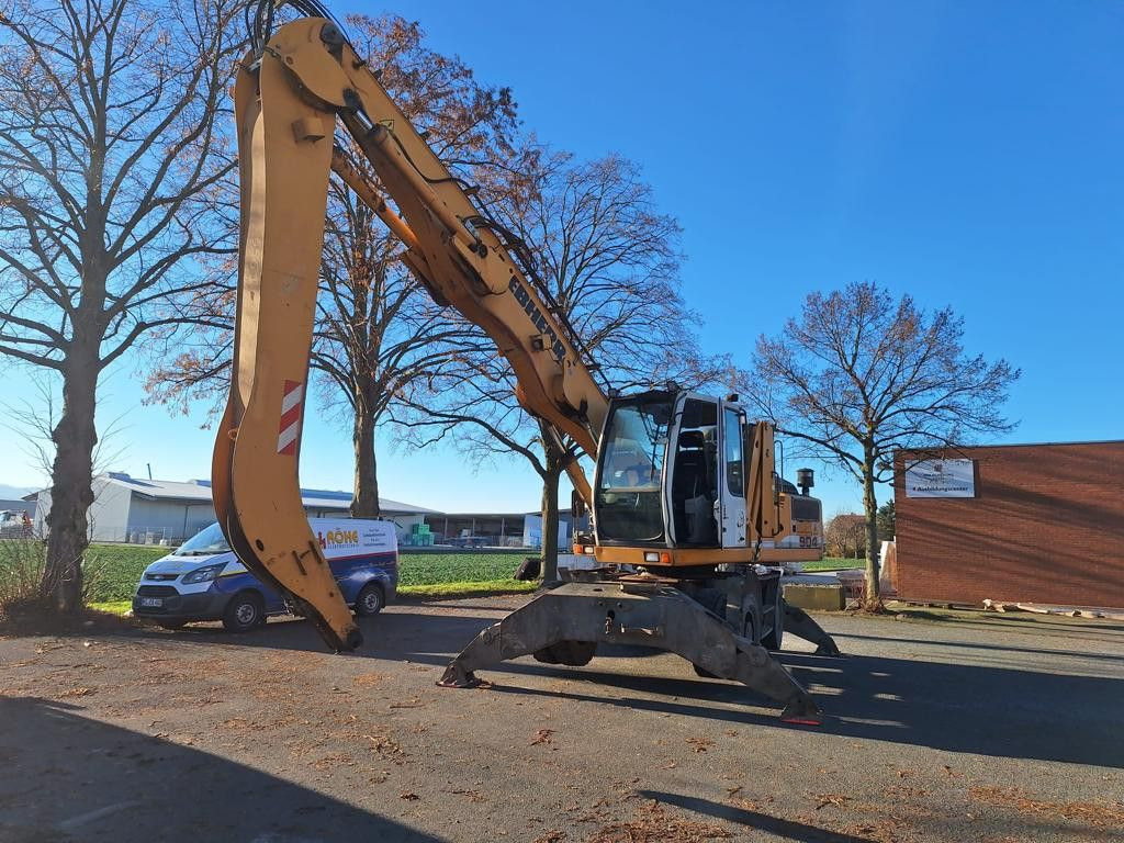 Escavadeira de rodas Liebherr A904C  Umschlagbagger Greifer +Magnetvorbereitun: foto 1