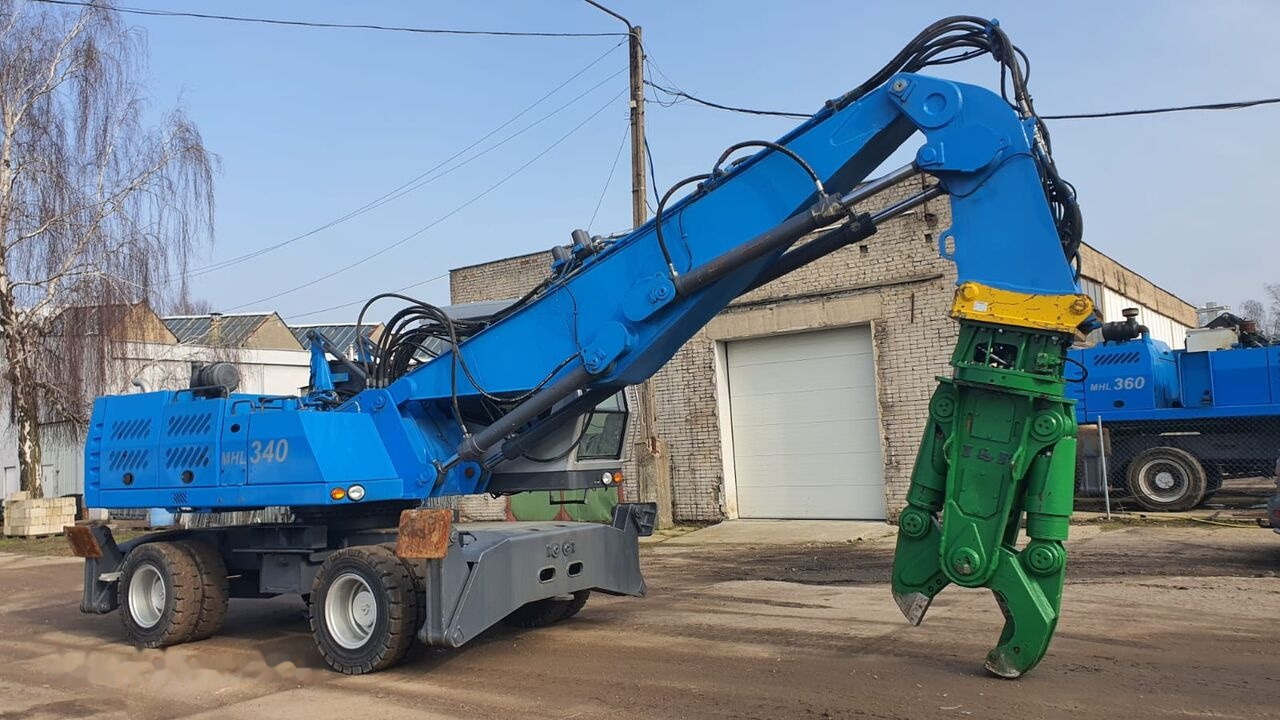 Fuchs MHL 340D FQC + LST 3to shear - Manipulador de material: foto 5 Fuchs MHL 340D FQC + LST 3to shear - Manipulador de material: foto 5