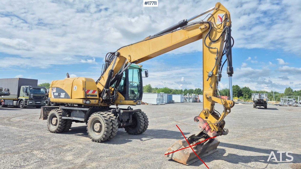 2008 CAT M316D - Escavadeira de rodas: foto 1 2008 CAT M316D - Escavadeira de rodas: foto 1