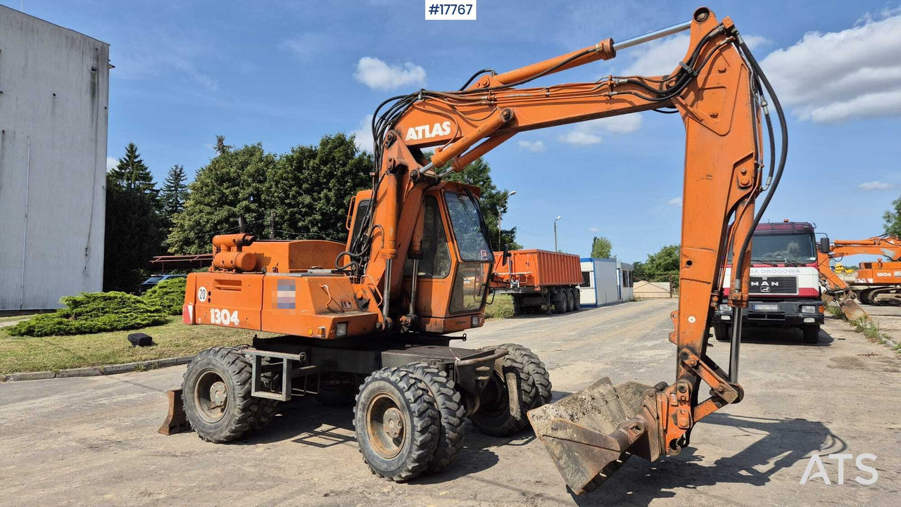 ATLAS 1304 wheeled excavator (1993) - Escavadeira de rodas: foto 1 ATLAS 1304 wheeled excavator (1993) - Escavadeira de rodas: foto 1