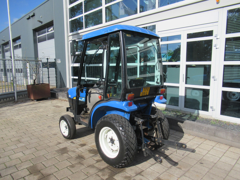 New Holland TC21D 4WD 4x4 Cabine Verwarming - Trator: foto 3 New Holland TC21D 4WD 4x4 Cabine Verwarming - Trator: foto 3