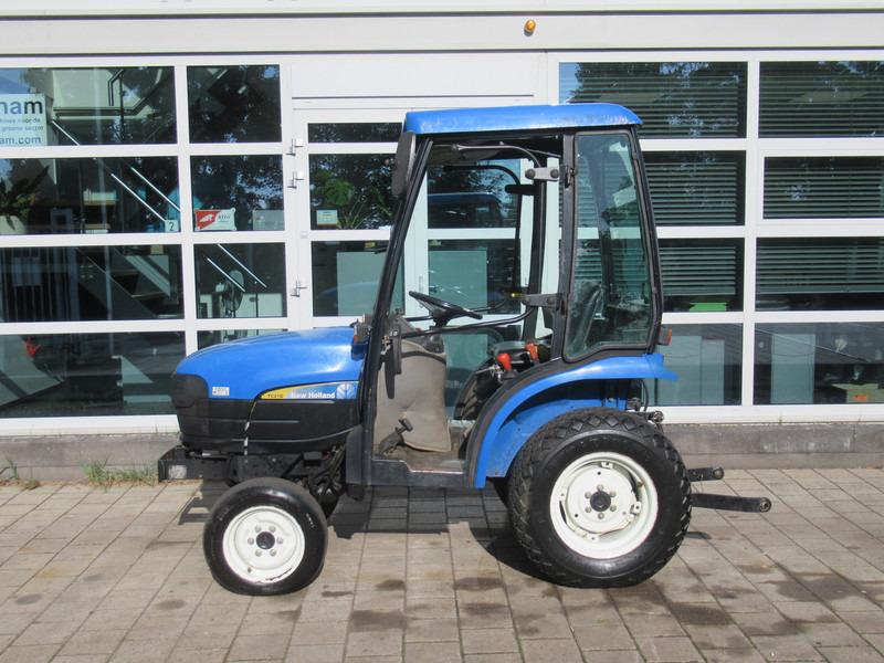 New Holland TC21D 4WD 4x4 Cabine Verwarming - Trator: foto 2 New Holland TC21D 4WD 4x4 Cabine Verwarming - Trator: foto 2