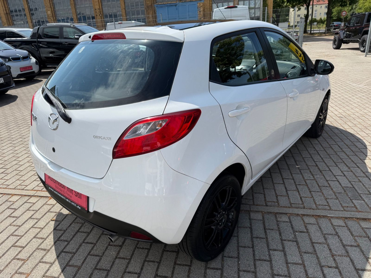 Mazda 2 Lim. 1.3 Origami 5 TÜER KLIMA SHZ TÜV NEU - Automóvel: foto 4 Mazda 2 Lim. 1.3 Origami 5 TÜER KLIMA SHZ TÜV NEU - Automóvel: foto 4