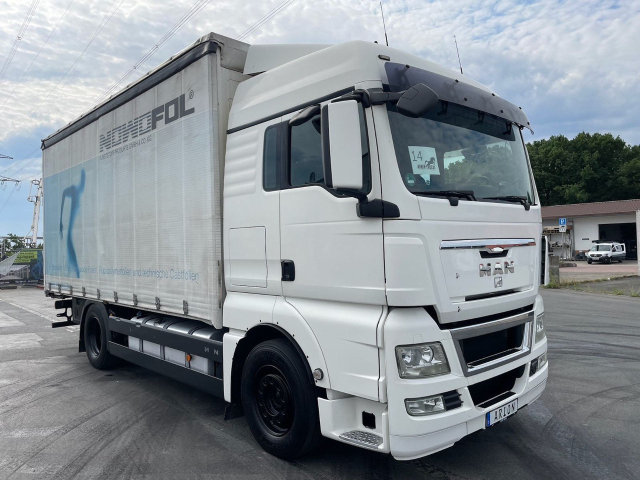 MAN TGX 18.440 4x2 BL Pritsche+Plane/AC/2xBett/EU5 - Camião de lona: foto 1 MAN TGX 18.440 4x2 BL Pritsche+Plane/AC/2xBett/EU5 - Camião de lona: foto 1