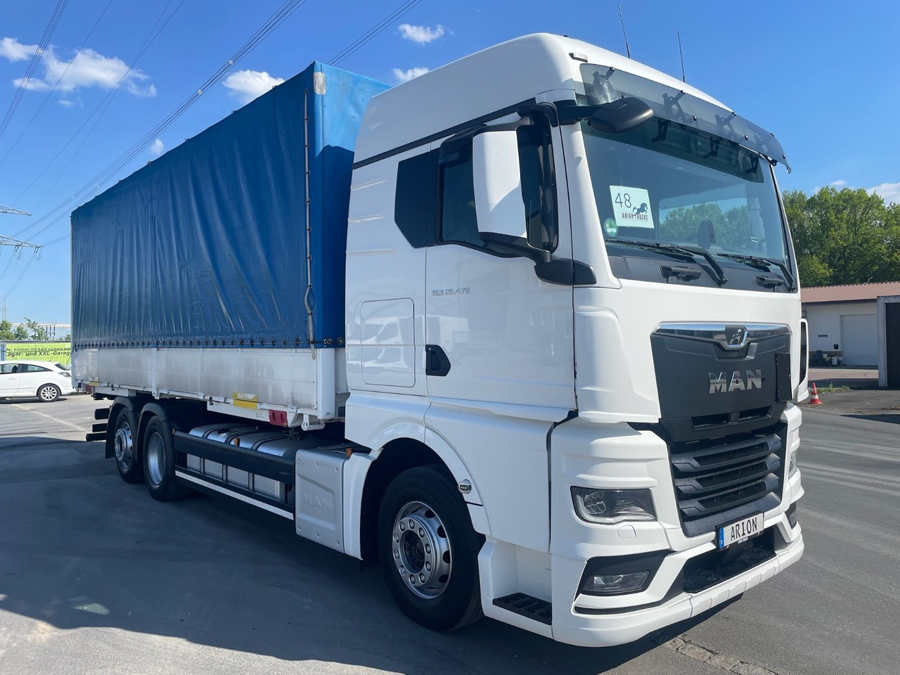 MAN TGX 26.470 6x2-4 LL Pritsche+Plane/BDF/NLA/EU6d - Camião de lona: foto 1 MAN TGX 26.470 6x2-4 LL Pritsche+Plane/BDF/NLA/EU6d - Camião de lona: foto 1
