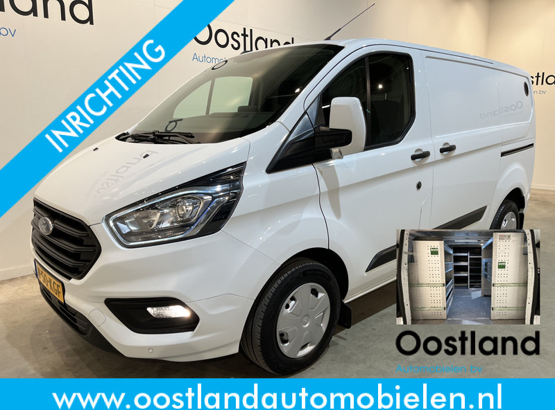 Ford Transit Custom 300 2.0 TDCI L1H1 Trend 130 PK / Servicebus / Bott Inrichting / Euro 6 / Schuifdeur L + R / Airco / CarPlay / Klep / PDC / Navigatie / 3-Zits / BPM VRIJ !! - Furgão compacto: foto 1 Ford Transit Custom 300 2.0 TDCI L1H1 Trend 130 PK / Servicebus / Bott Inrichting / Euro 6 / Schuifdeur L + R / Airco / CarPlay / Klep / PDC / Navigatie / 3-Zits / BPM VRIJ !! - Furgão compacto: foto 1