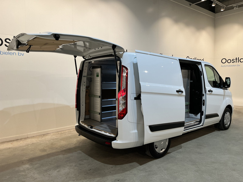 Ford Transit Custom 300 2.0 TDCI L1H1 Trend 130 PK / Servicebus / Bott Inrichting / Euro 6 / Schuifdeur L + R / Airco / CarPlay / Klep / PDC / Navigatie / 3-Zits / BPM VRIJ !! - Furgão compacto: foto 2 Ford Transit Custom 300 2.0 TDCI L1H1 Trend 130 PK / Servicebus / Bott Inrichting / Euro 6 / Schuifdeur L + R / Airco / CarPlay / Klep / PDC / Navigatie / 3-Zits / BPM VRIJ !! - Furgão compacto: foto 2