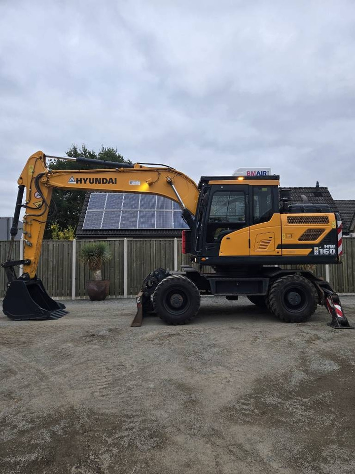 Hyundai HW 160  - Escavadeira de rodas: foto 1 Hyundai HW 160  - Escavadeira de rodas: foto 1