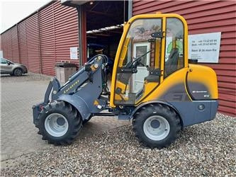 Eurotrac W12S med førerhus, skovl og gafler - Pá carregadora de rodas: foto 1 Eurotrac W12S med førerhus, skovl og gafler - Pá carregadora de rodas: foto 1
