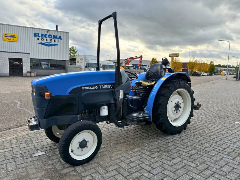 New Holland TN65V Smalspoortrekker - Mini trator: foto 1 New Holland TN65V Smalspoortrekker - Mini trator: foto 1