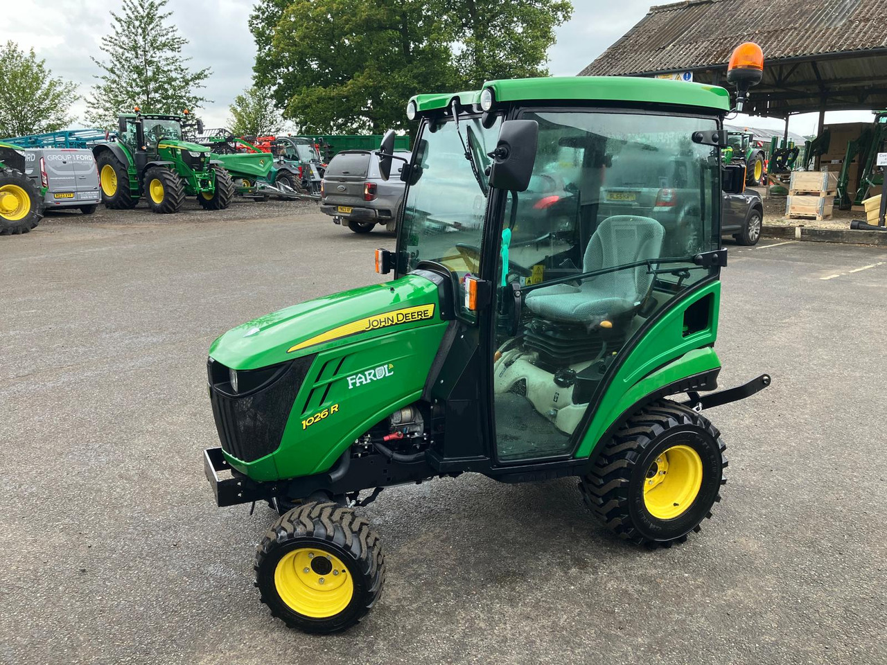 John Deere 1026R compact tractor - Mini trator: foto 1 John Deere 1026R compact tractor - Mini trator: foto 1