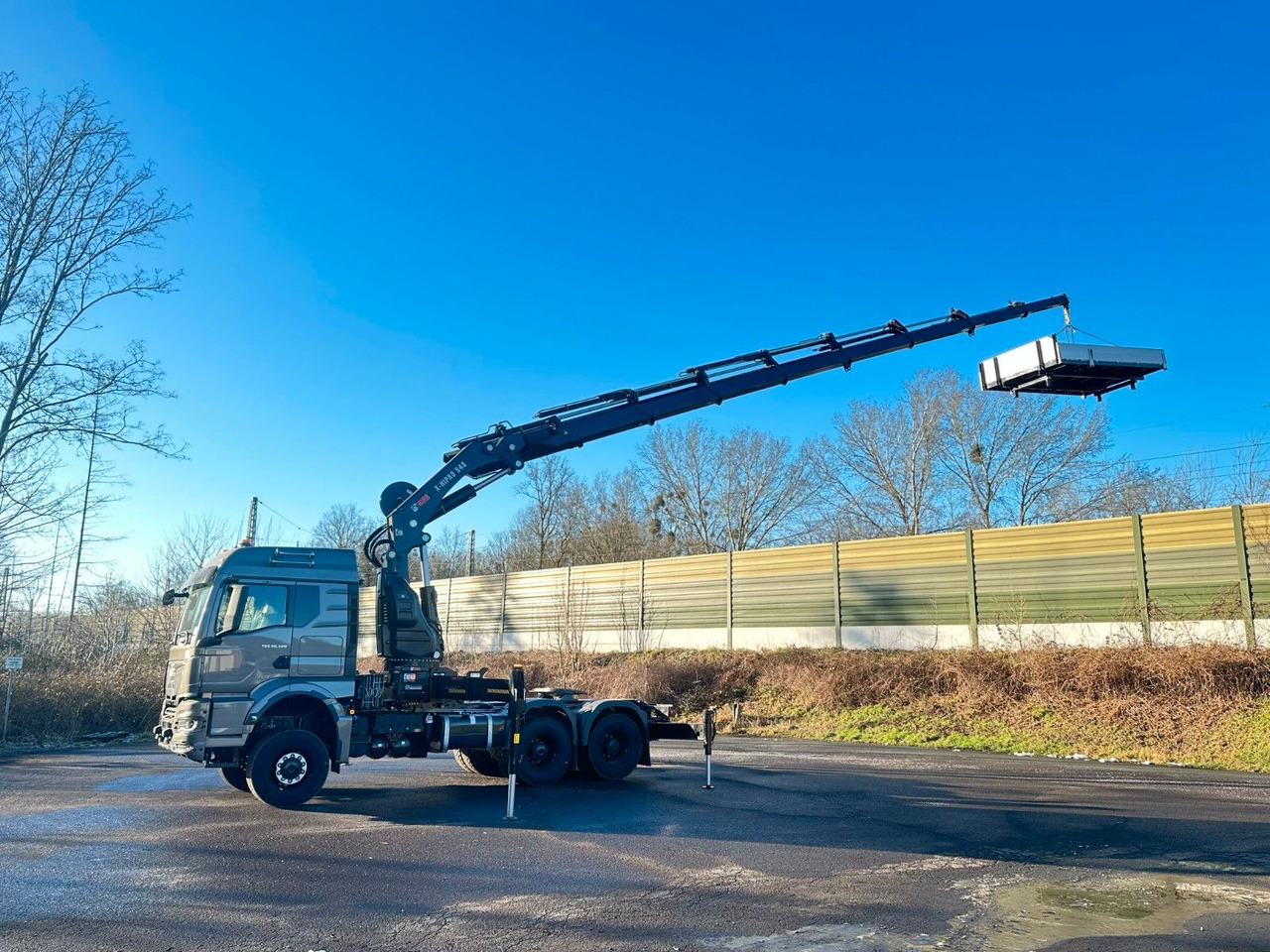 MAN TGS 26.520 6x6 Kran HIAB X-HIPRO 548E-8 - Camião grua: foto 1 MAN TGS 26.520 6x6 Kran HIAB X-HIPRO 548E-8 - Camião grua: foto 1