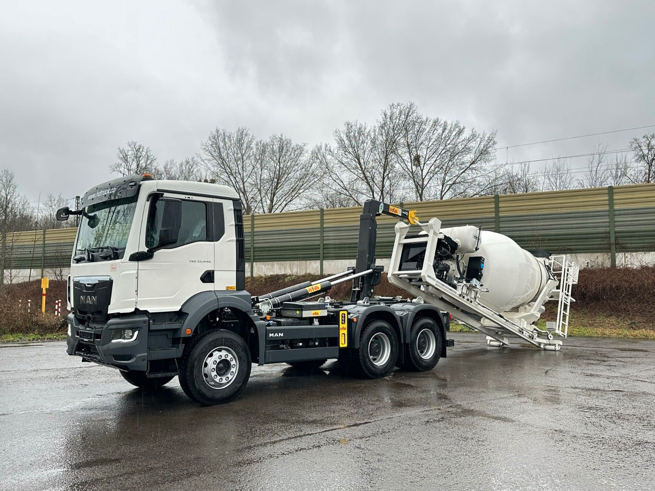 MAN TGS 33.440 6x4 Euro6e Abroller + Fahrmischer - Camião polibenne, Camião grua: foto 1 MAN TGS 33.440 6x4 Euro6e Abroller + Fahrmischer - Camião polibenne, Camião grua: foto 1