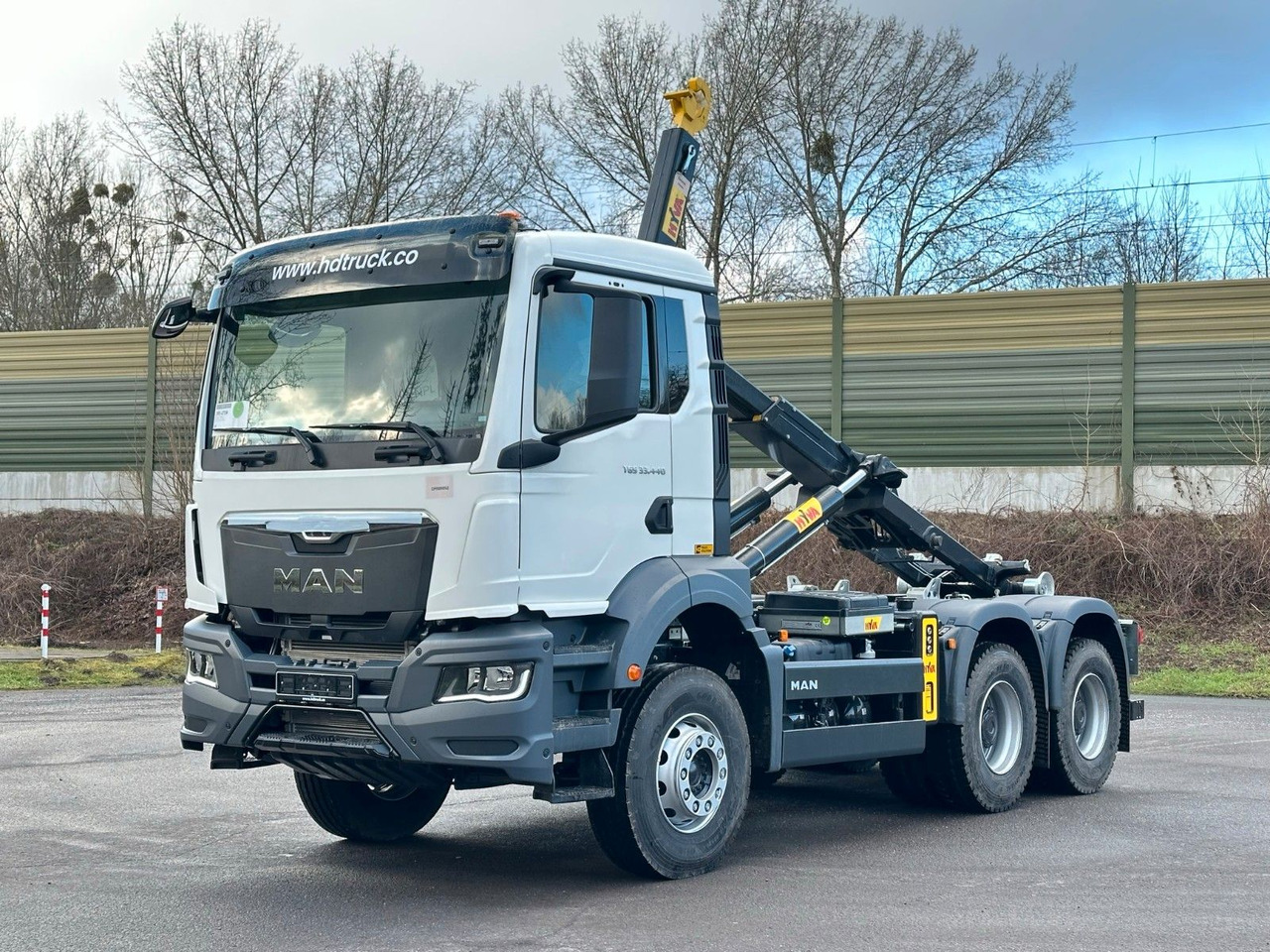 MAN TGS 33.440 6x4 Euro6e Abrollkipper Hyva - Camião polibenne, Camião grua: foto 1 MAN TGS 33.440 6x4 Euro6e Abrollkipper Hyva - Camião polibenne, Camião grua: foto 1