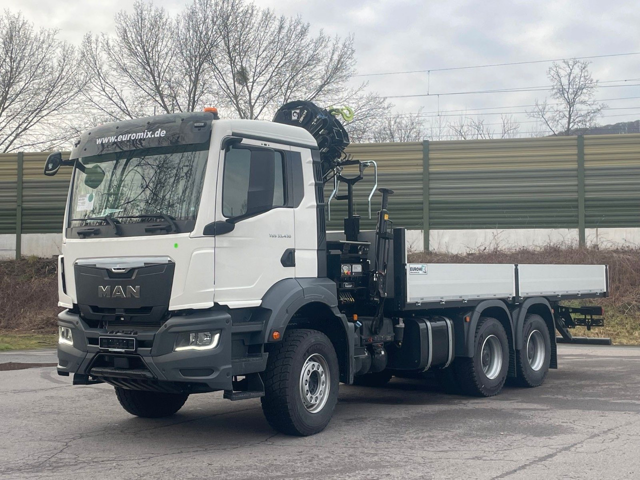MAN TGS 33.440 6x4 Kran HIAB 138-3 - Camião de caixa aberta/ Plataforma, Camião grua: foto 2 MAN TGS 33.440 6x4 Kran HIAB 138-3 - Camião de caixa aberta/ Plataforma, Camião grua: foto 2