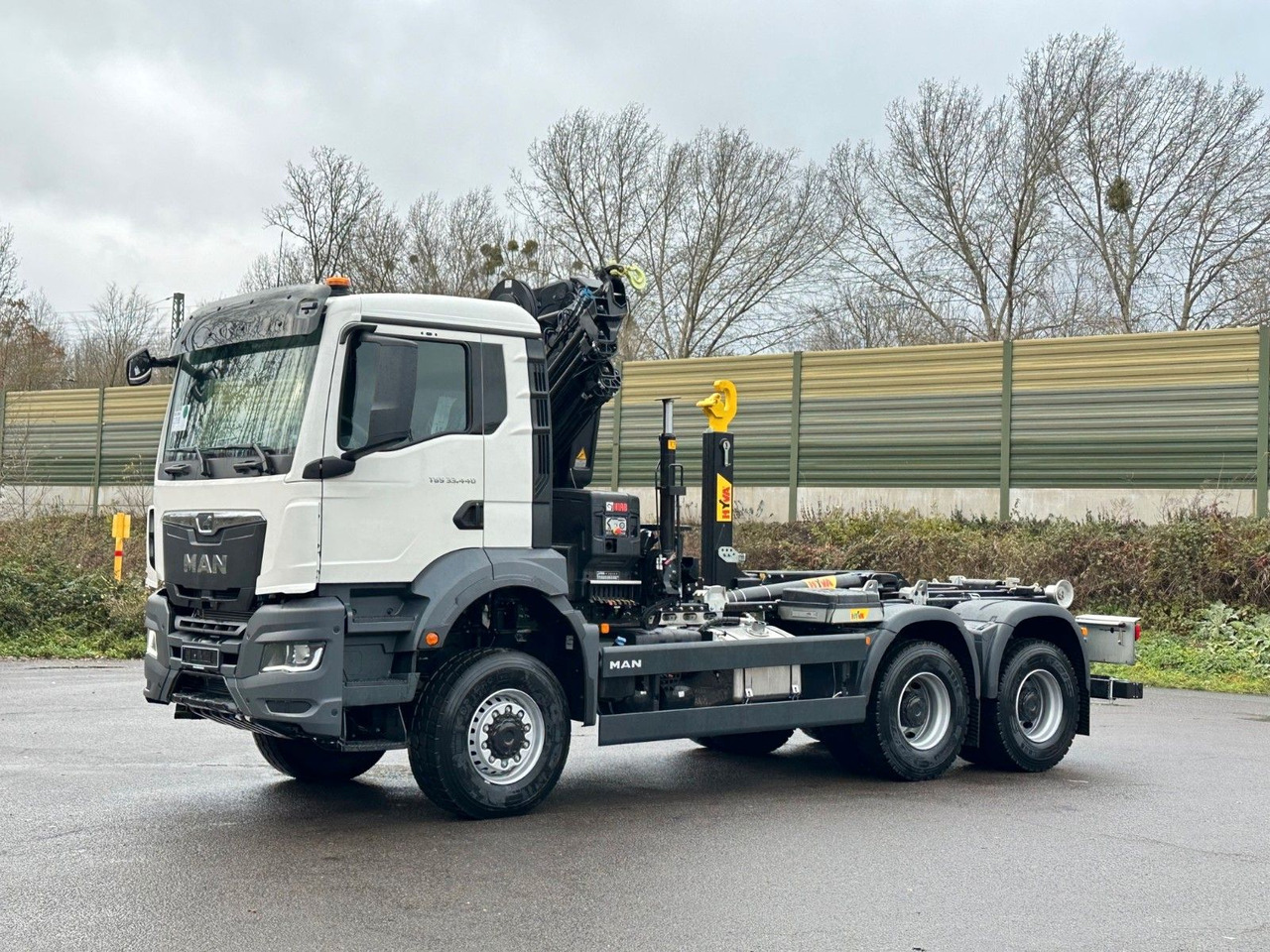 MAN TGS 33.440 6x6 BB Abrollkipper+Kran Hiab 228-6 - Camião polibenne, Camião grua: foto 3 MAN TGS 33.440 6x6 BB Abrollkipper+Kran Hiab 228-6 - Camião polibenne, Camião grua: foto 3