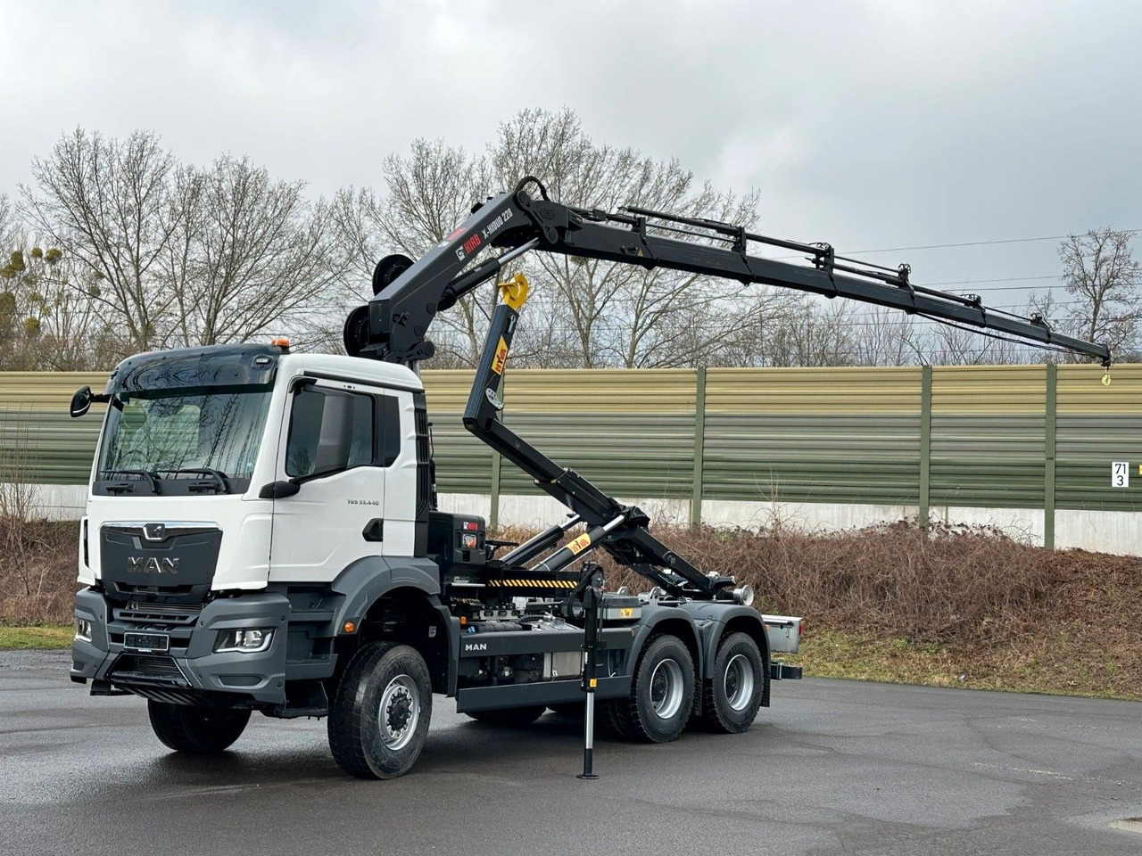 MAN TGS 33.440 6x6 BB Abrollkipper+Kran Hiab 228-6 - Camião polibenne, Camião grua: foto 1 MAN TGS 33.440 6x6 BB Abrollkipper+Kran Hiab 228-6 - Camião polibenne, Camião grua: foto 1