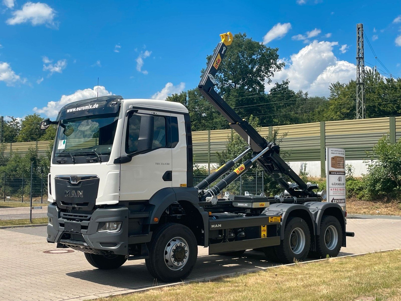 MAN TGS 33.440 6x6 Euro6e Hyva - Hiab MultiLift - Camião polibenne, Camião grua: foto 1 MAN TGS 33.440 6x6 Euro6e Hyva - Hiab MultiLift - Camião polibenne, Camião grua: foto 1