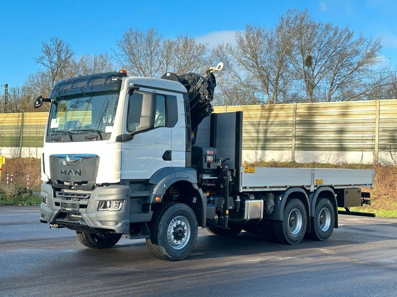 MAN TGS 33.440 6x6 Kran HIAB 228-6 - Camião de caixa aberta/ Plataforma, Camião grua: foto 3 MAN TGS 33.440 6x6 Kran HIAB 228-6 - Camião de caixa aberta/ Plataforma, Camião grua: foto 3